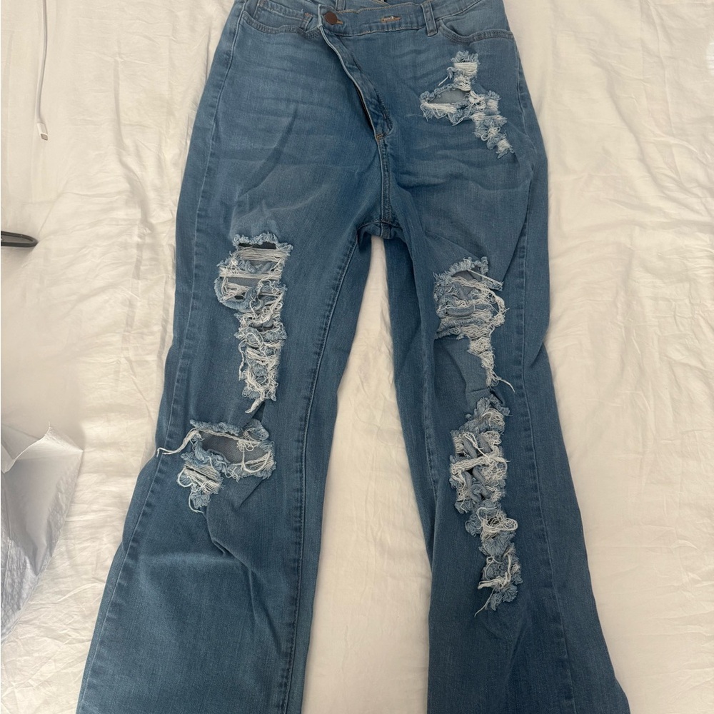 Fashion Nova Ripped Blue Flare Jeans